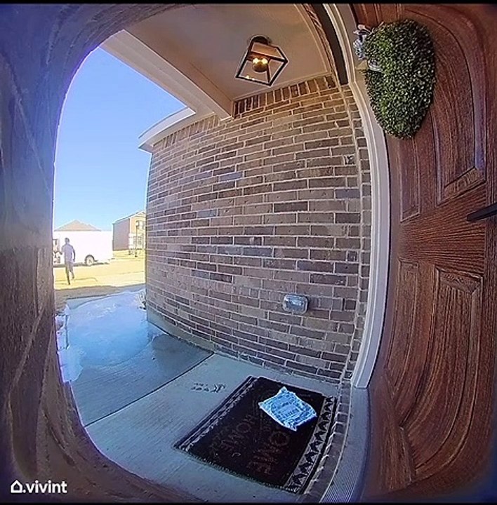 FedEx Delivery Guy Slides Across Ice Delivering Package in Style