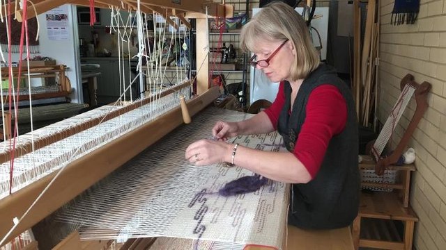 Fiona Durman demonstrates her weaving techniques