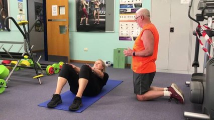 John Cook demonstrates fitness class