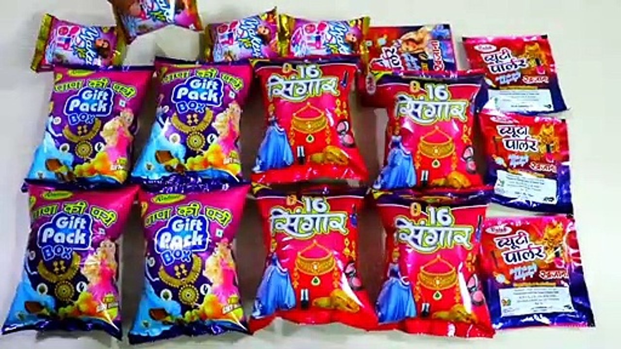 Collection Of Makeup Snacks Mein Nikle Nailpolish, Lipstick, Gold Chain Moj ho gai aaj to Dosto