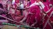 People In Mathura Celebrate Lathmar Holi With Sticks And Flowers