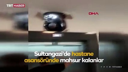 Asansörde mahsur kaldılar, duvarı kırarak kurtuldular