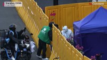 Shanghai neighbourhoods barricaded as Covid cases grow