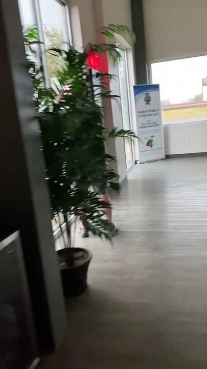 Round Rock Tornado Forming in the Distance From Car Dealership