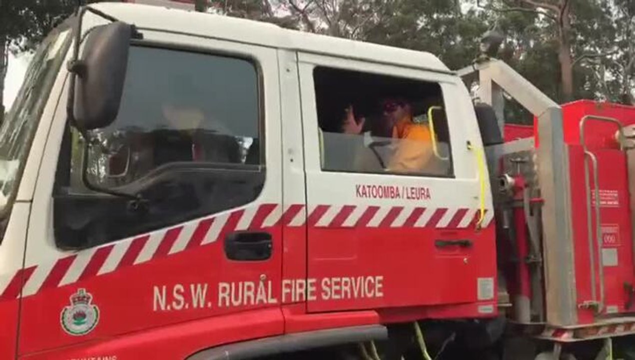 Firefighters roll out of Charles Sturt University for another big day of fighting fires on the Mid North Coast.