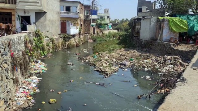 50 feet drain turned into 15 feet, heaps of garbage everywhere