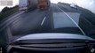 Van driver flips over a motorway crash barrier into oncoming traffic