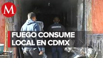 Bomberos controlan incendio en un local de comida en la CdMx