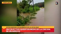 Un colectivo quedó en medio de la crecida de un arroyo