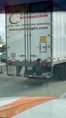 Man Spotted Sitting on Tractor Trailer