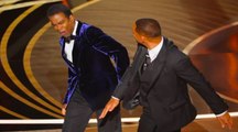 Will Smith punches Chris Rock on stage at the Oscars