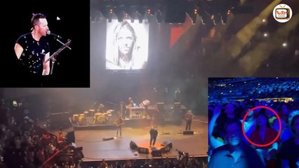 Dakota Johnson was touched on audience seats when cheering for Chris Martin to honor Taylor Hawkins