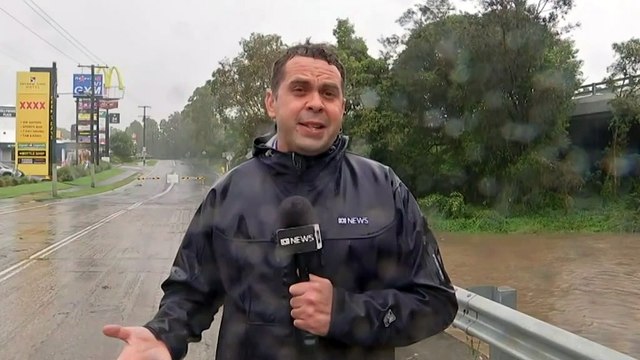 One man dead, one reported missing in Queensland floodwaters