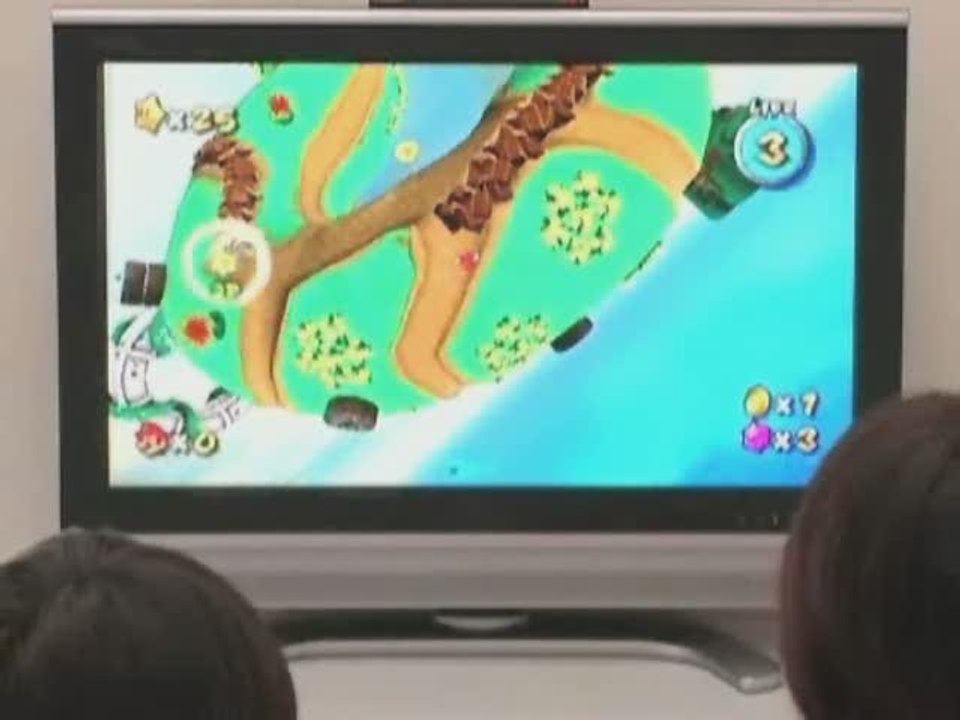 Super Mario Galaxy : Maman et son fiston jouent à Super Mario Galaxy