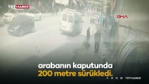 Çarptığı polisi kaputun üstünde taşıdı