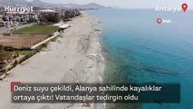 Deniz suyu çekildi, Alanya sahilinde kayalıklar ortaya çıktı! Vatandaşlar tedirgin oldu