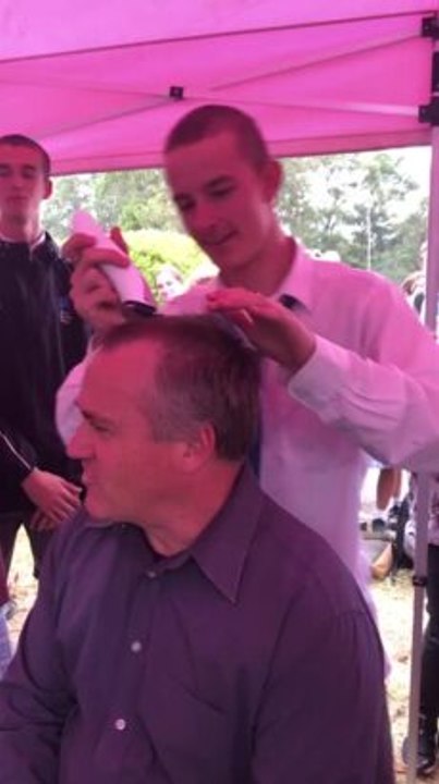 Teacher head shave