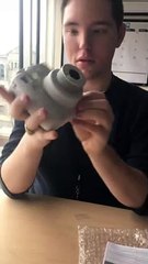 Guy Trying to Turn on Camera Surprised by Unexpected Flash