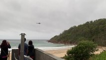Water bombers refill at One Mile beach