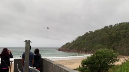 Water bombers refill at One Mile beach