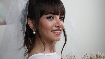 تسريحة الشعر المرفوع بالأسلوب المنخفض للعروس