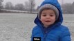 'Wow!' One-year-old boy reacts with awe as he stands under falling snow for the first time in heartwarming video