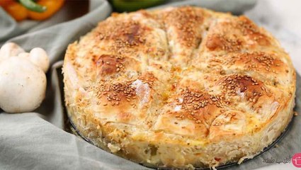 طريقة عمل صينية الجلاش بالجبنة والخضار