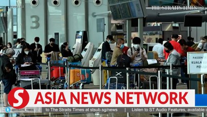The Straits Times | Check-in queues return to Changi Airport