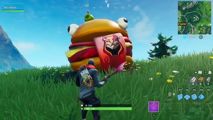 Fortnite, mission Road Trip : Visiter la tête Durr Burger portant la marque du Nomade, un dinosaure et une tête de pierre