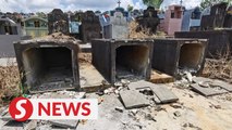 Sibu families shocked to find loved ones' graves defiled, remains missing
