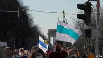 Russian anti-war protesters fly modified Russian flag