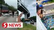 Shipping container falls off Klang flyover, smashes into two lorries below