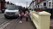Worthing bin strikes: Young girls take to the streets in an effort to clear them of rubbish