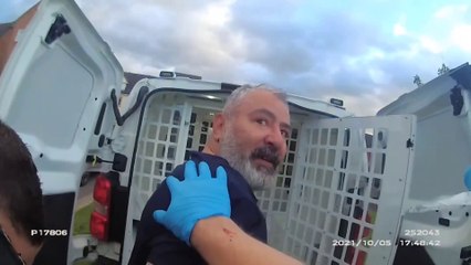 A man arrested for killing his neighbour laughs and tells police: "I warned you"