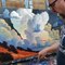 Artist Paints Landscape With Clouds in Oil Paint