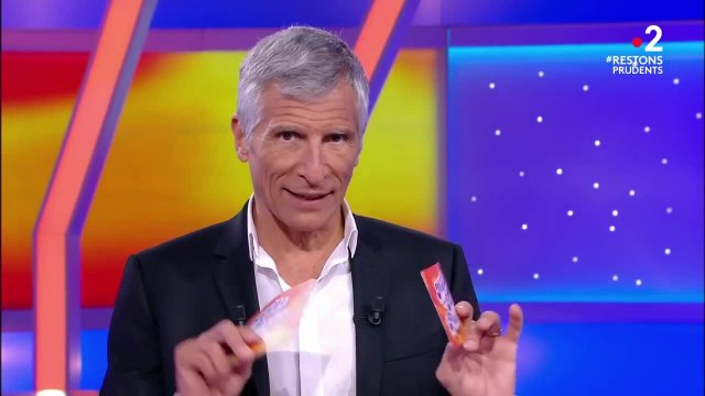 FEMME ACTUELLE - Tout le monde veut prendre sa place : Nagui interroge un joueur sur les seins de sa femme