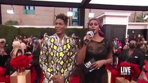 Jon Batiste Breaks Into Song Mid-Interview at Grammys 2022  E! Red Carpet & Award Shows