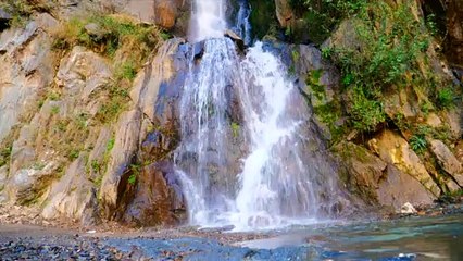 CASCADING WATER FROM THE WATERFALLS