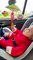 Baby Excitedly Plays with Toy in Car