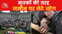 Protest against Massacre: People lies down with tied hands