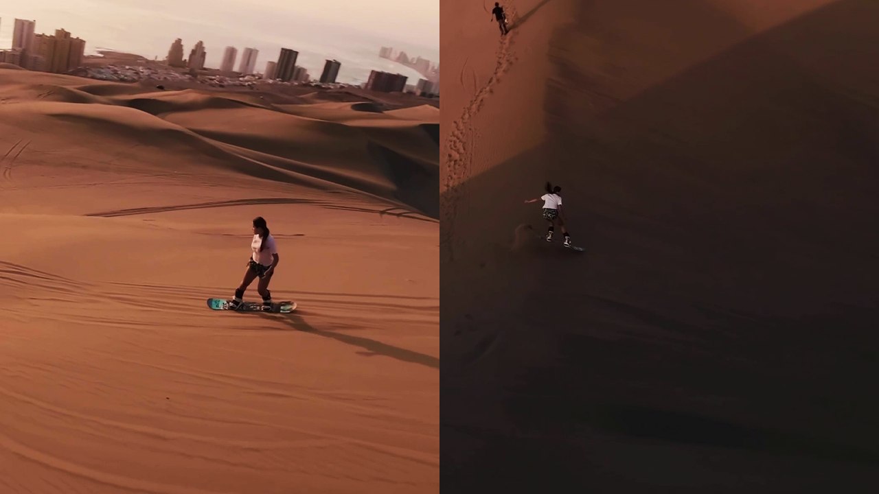 'Bucket-list worthy shot of a girl flawlessly sandboarding in Iquique'