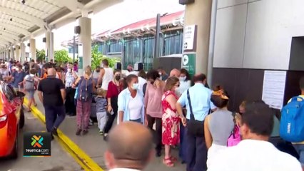 tn7-largas-filas-en-juan-santamaria-070422