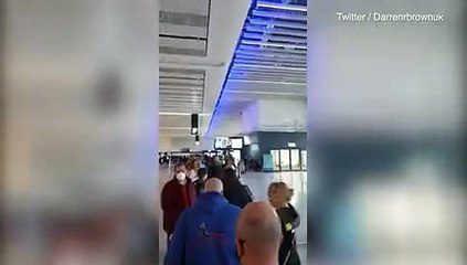 A car floats away after attempting to drive through floodwaters