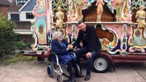 100-year-old being surprised with a street organ performance in her garden by one of the experts on the BBC's Repair Shop
