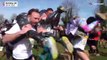 Wet, wet, wet! Couples get a dousing at UK Wife Carrying Championship