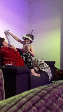 Little Brother Playing Oculus VR Whacks Older Brother in Mishap