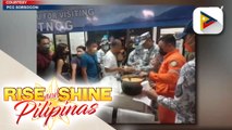 PCG, namahagi ng pagkain sa mga stranded na pasahero, truck drivers, at cargo helpers