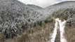 Drone - Nisanda yağan kar, ormanlık alanı beyaza bürüdü