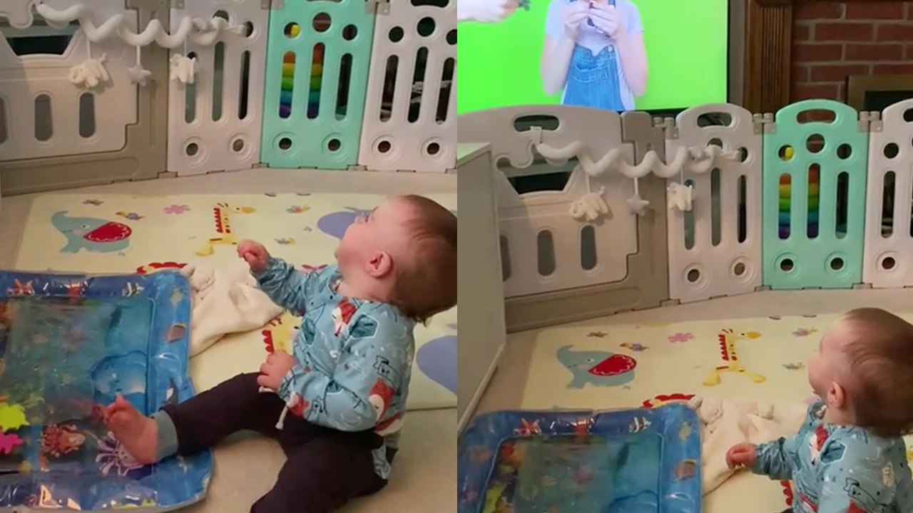 'Delightful baby boy giggles his heart out whil...