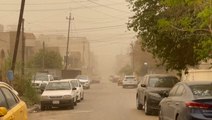 Orange sky as dust storm enshrouds Baghdad